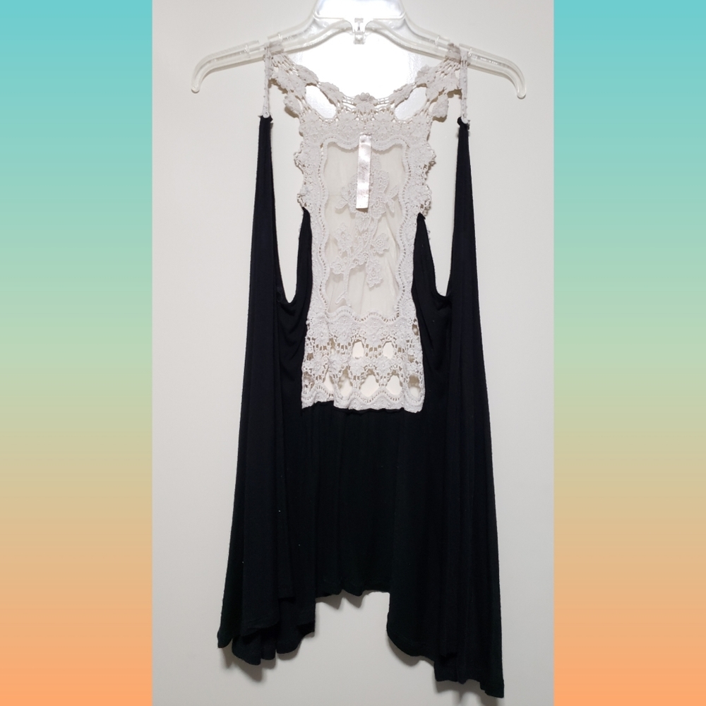 Black vest with white lace back